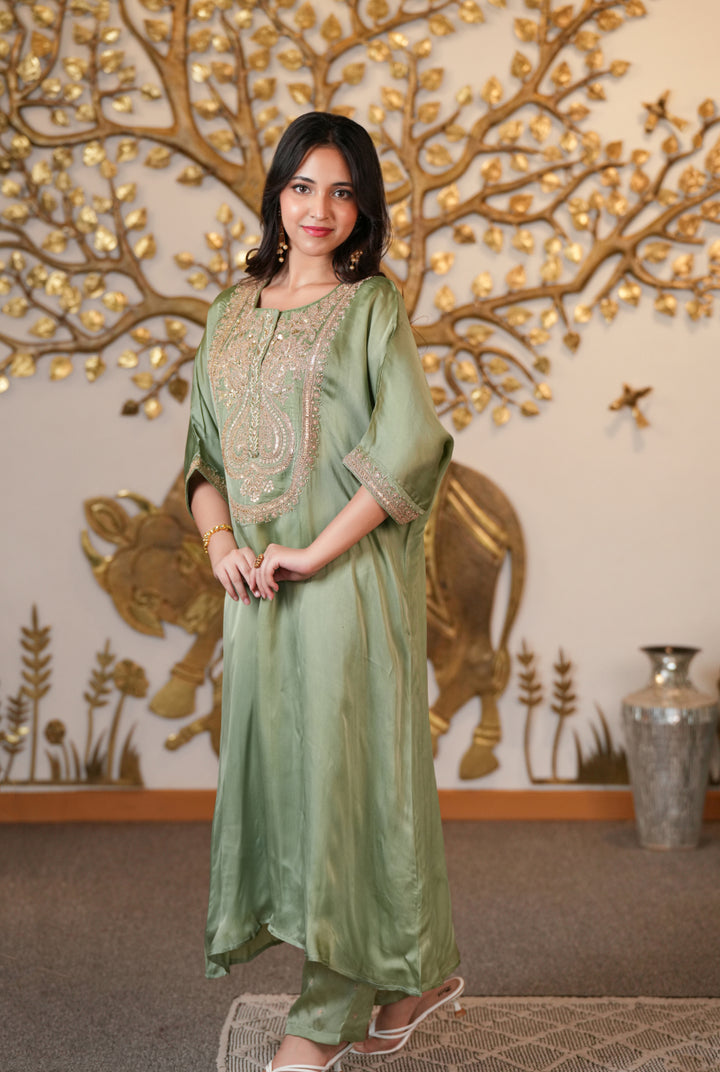 Organza Suit with Aari, Gota Patti, Pearl work.