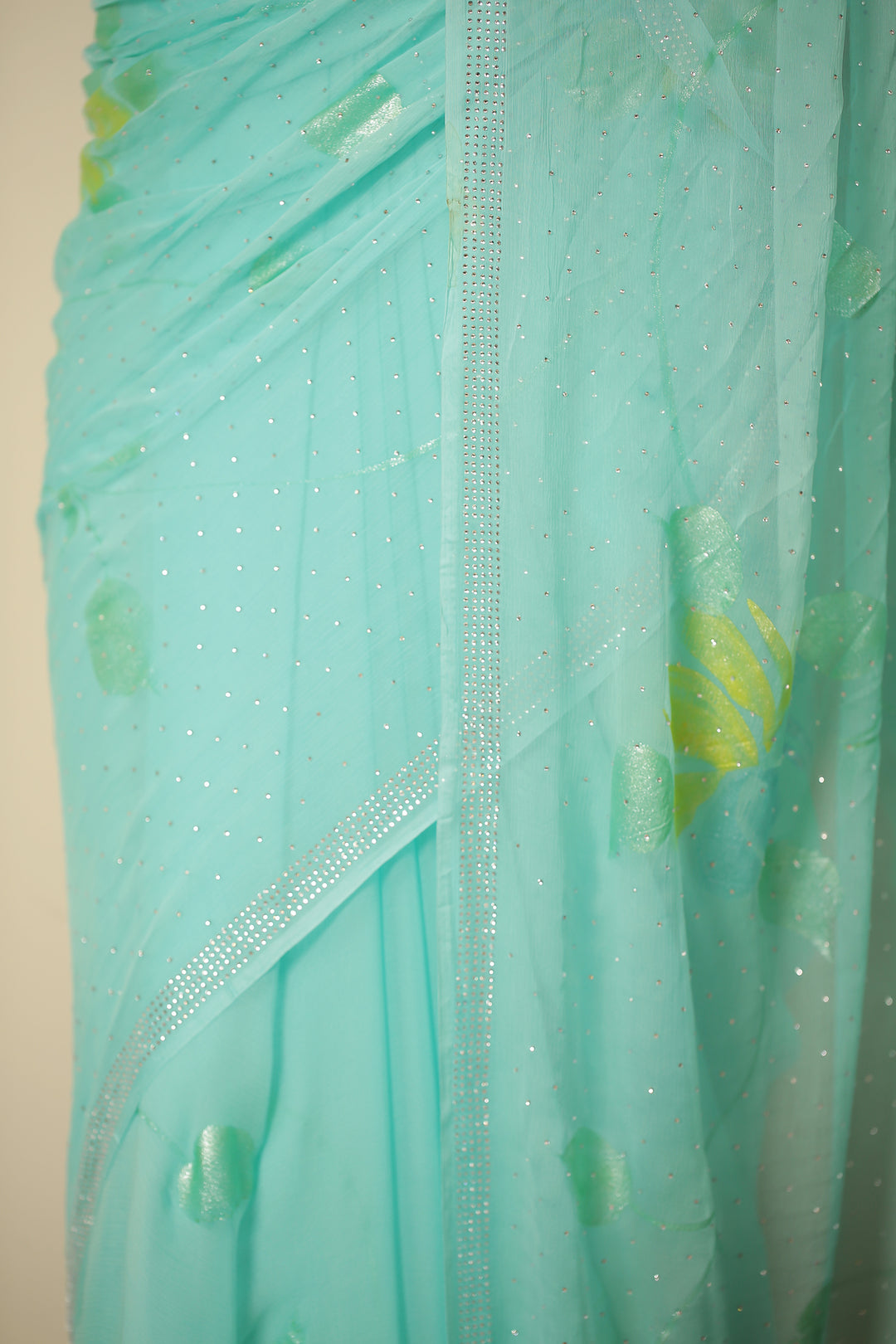 Foil Printed Chiffon Saree with Swarovski work.