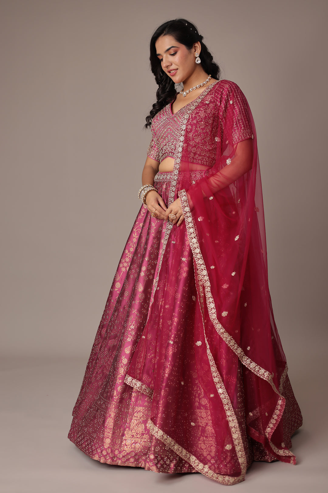 Handwoven Silk Lehenga Embellished with Swarovski and Thread work