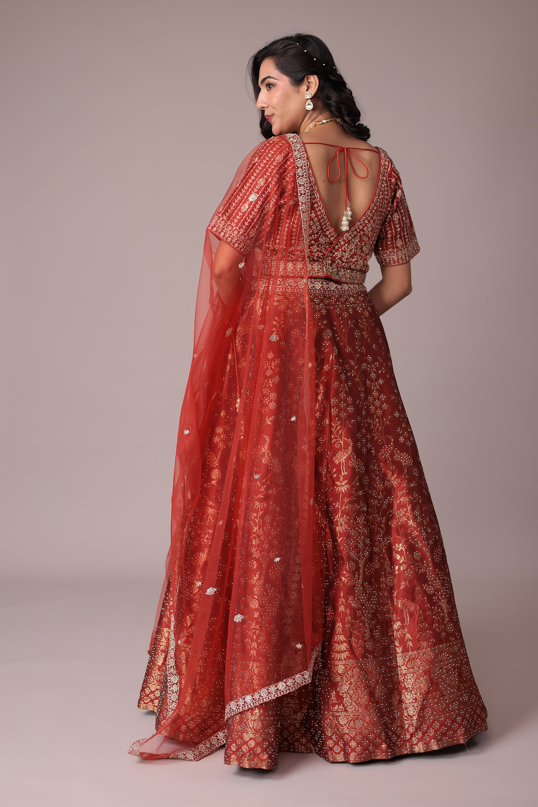Handwoven Silk Lehenga Embellished with Swarovski and Thread work