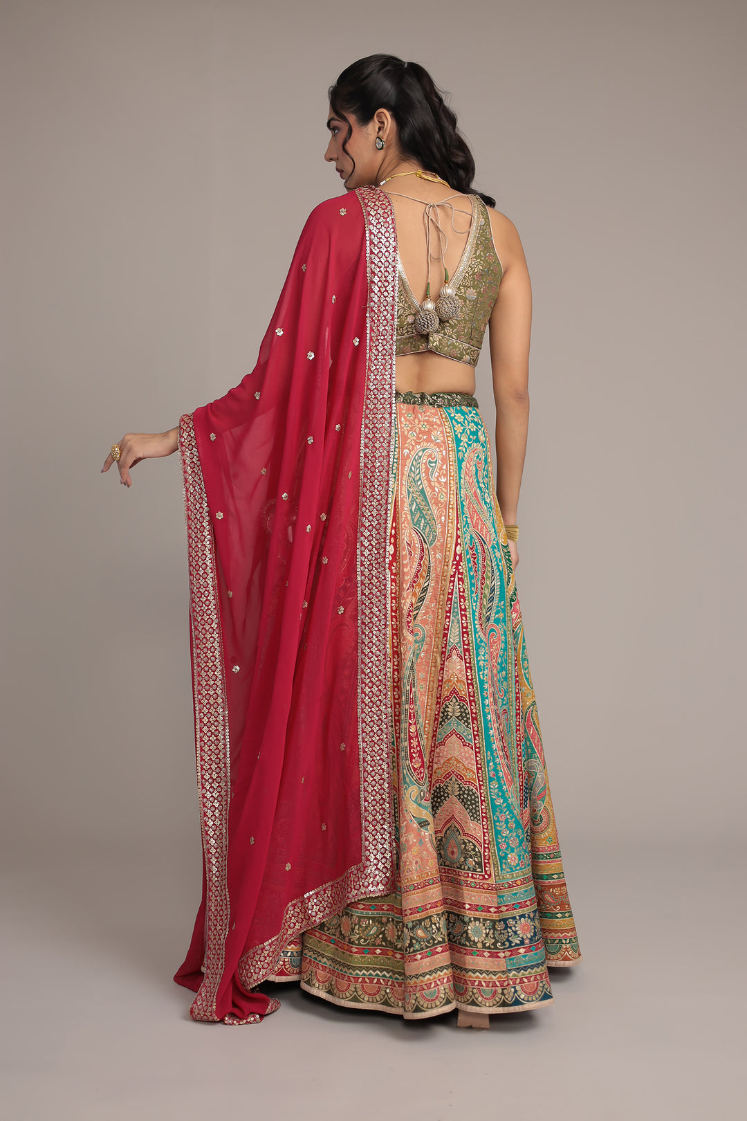 Handwoven Silk Lehenga Enhanced with Aari and Sequins work