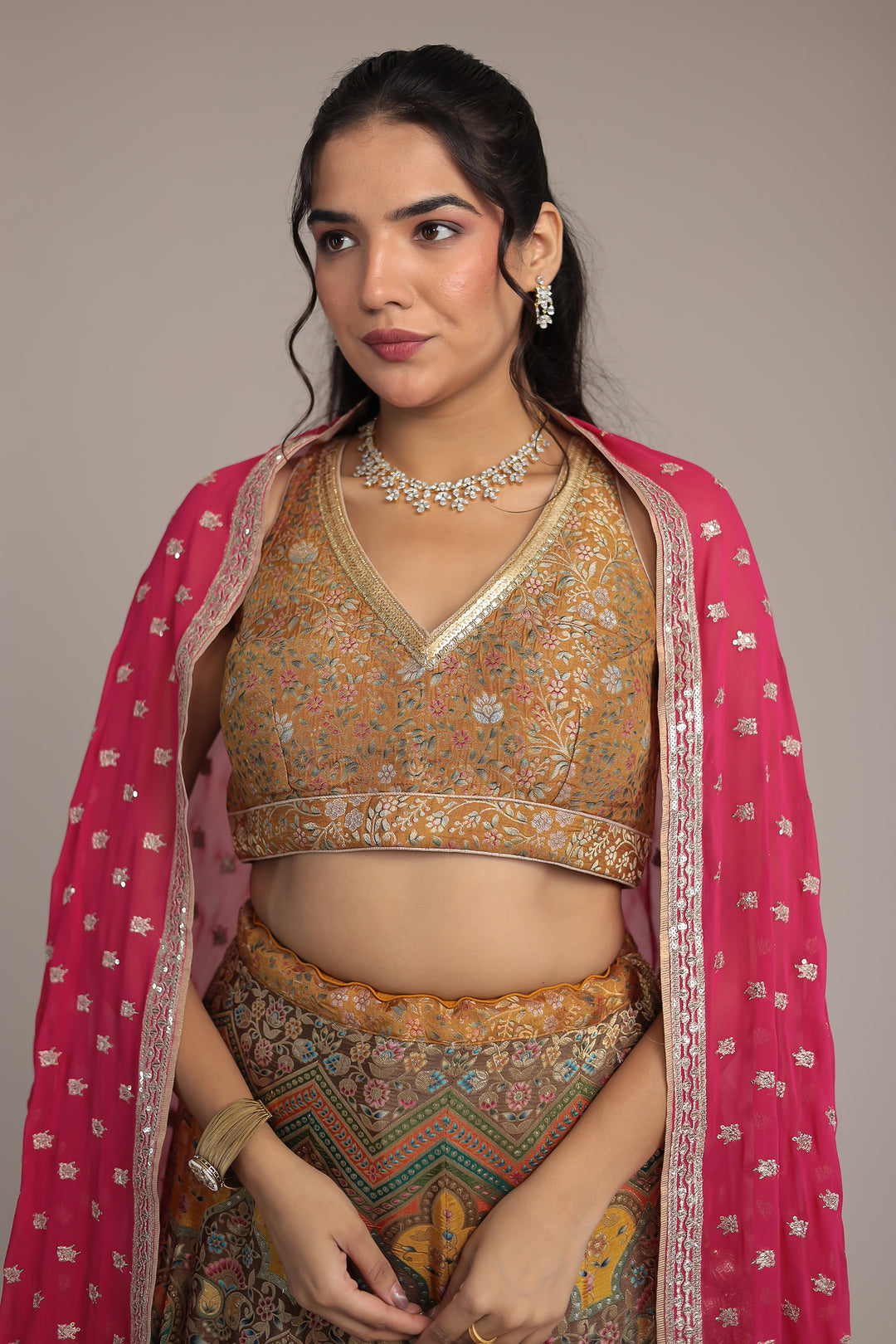 Multicolor Handwoven Silk Lehenga with Aari and Sequins work