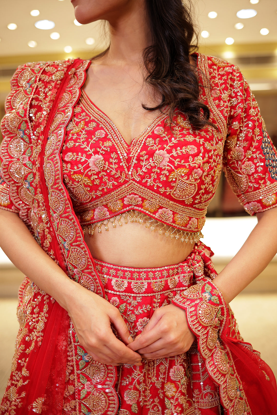 Raw silk Zardozi Lehenga with Sequins and Thread work.