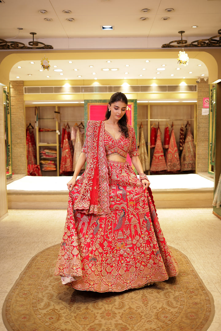 Raw silk Zardozi Lehenga with Sequins and Thread work.