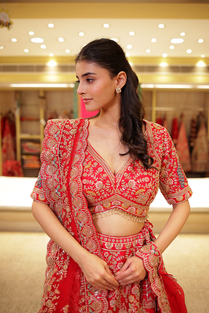 Raw silk Zardozi Lehenga with Sequins and Thread work.