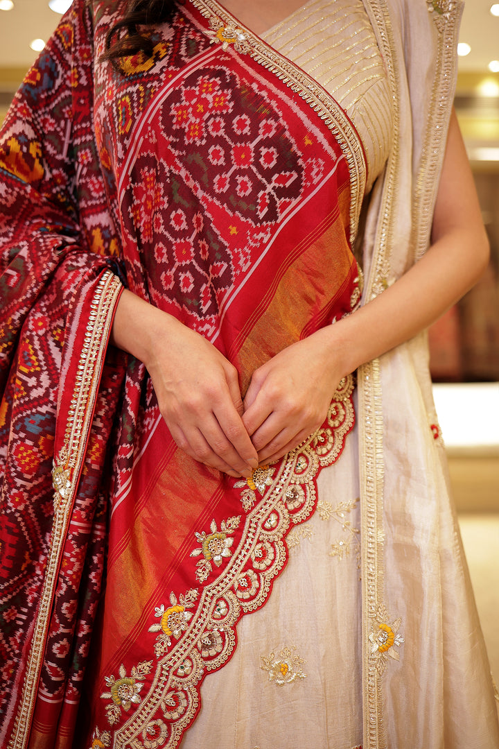 Raw silk Zardozi Lehenga with Thread and Zari work.