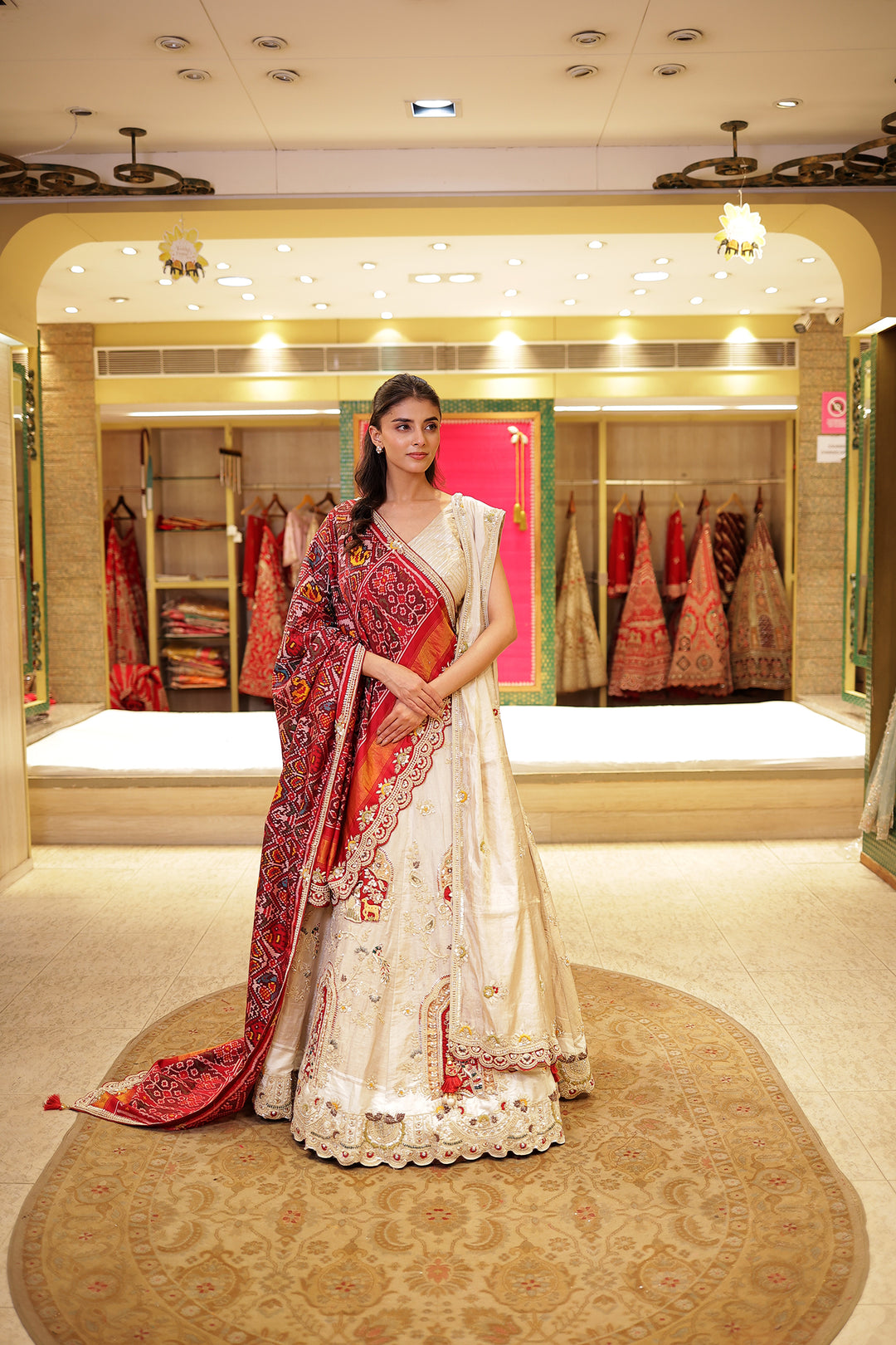 Raw silk Zardozi Lehenga with Thread and Zari work.