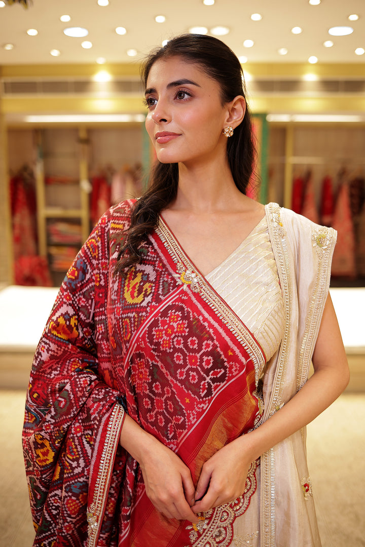 Raw silk Zardozi Lehenga with Thread and Zari work.