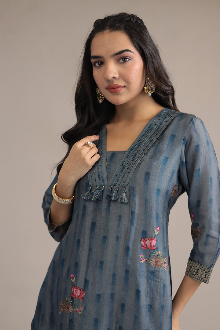 Printed Silk  Suit  with  Zari border work