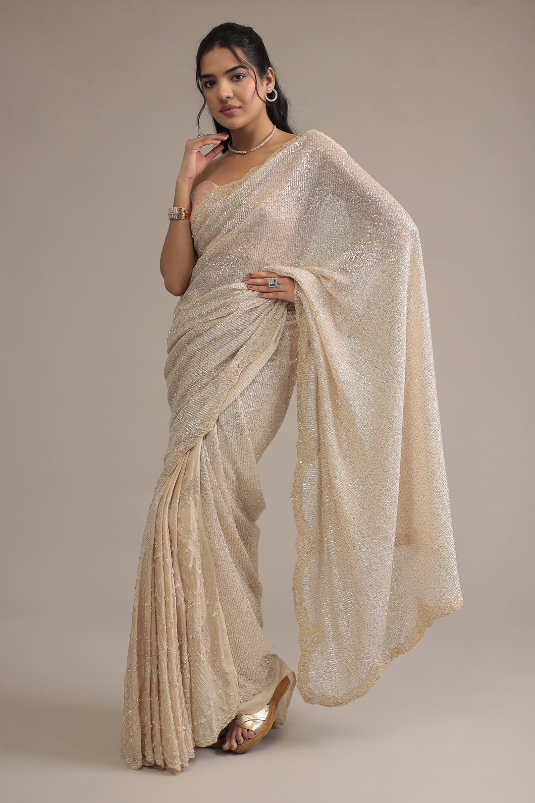 Peach Shimmer Net Silk Saree  with Cutdana and Sequins work