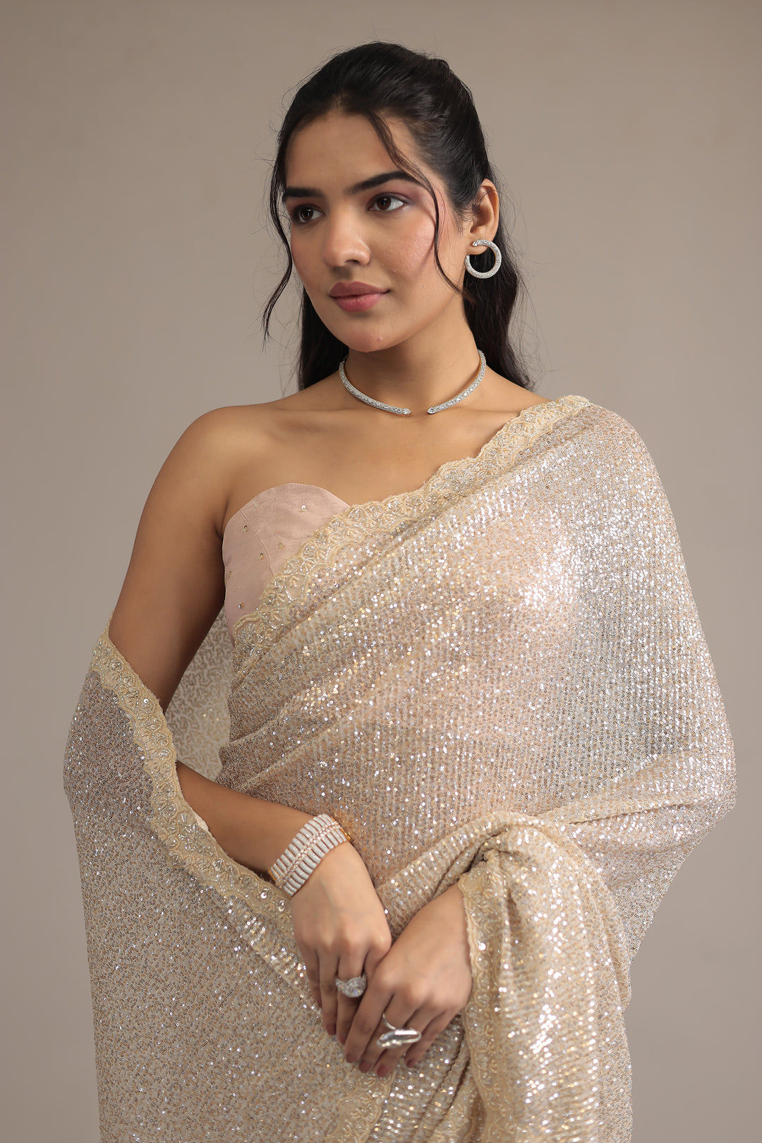 Peach Shimmer Net Silk Saree  with Cutdana and Sequins work