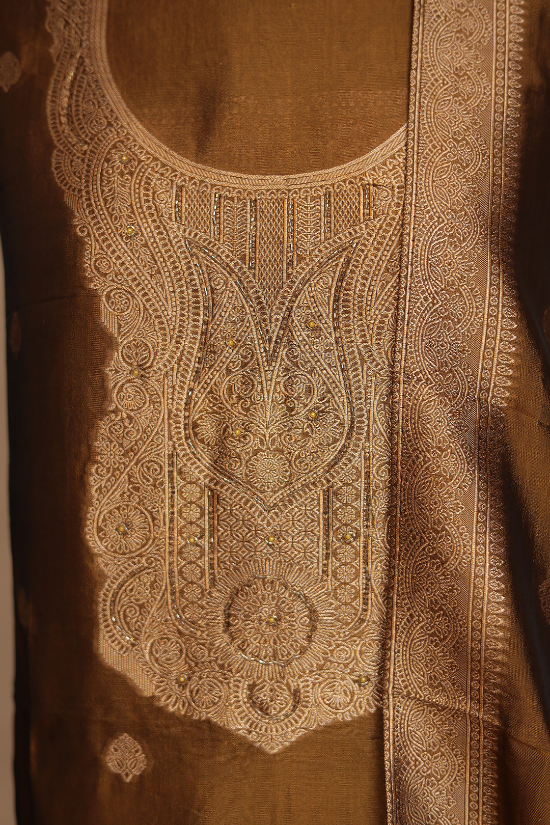 Banarasi silk Unstitched Suit with Cutdana work.
