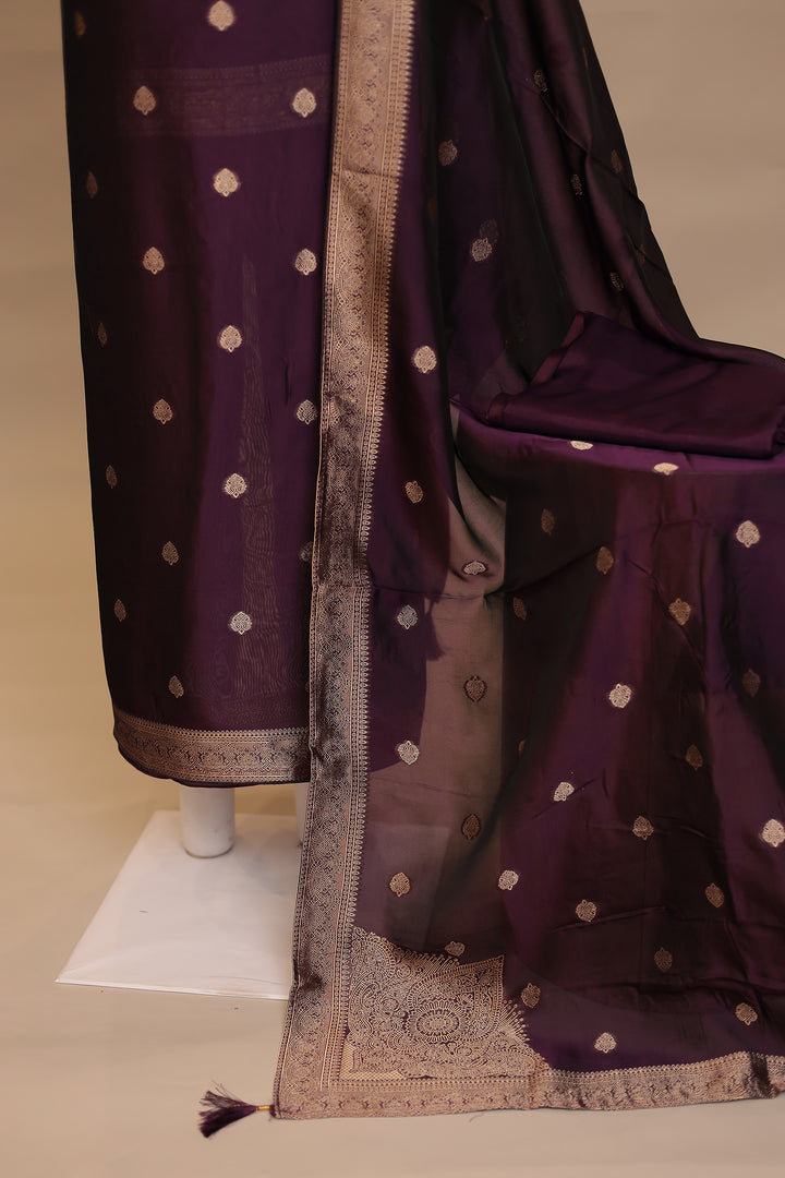 Banarasi silk Unstitched Suit with Cutdana work.