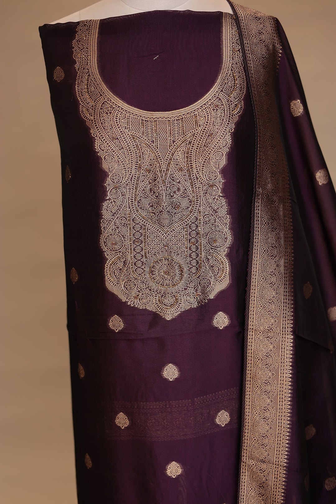 Banarasi silk Unstitched Suit with Cutdana work.