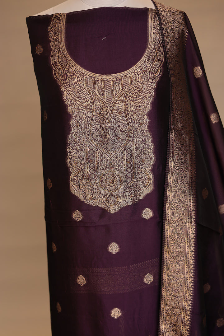 Banarasi silk Unstitched Suit with Cutdana work.