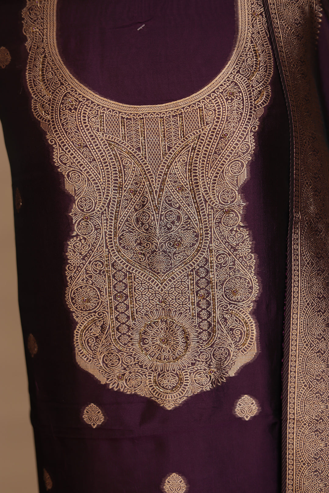 Banarasi silk Unstitched Suit with Cutdana work.