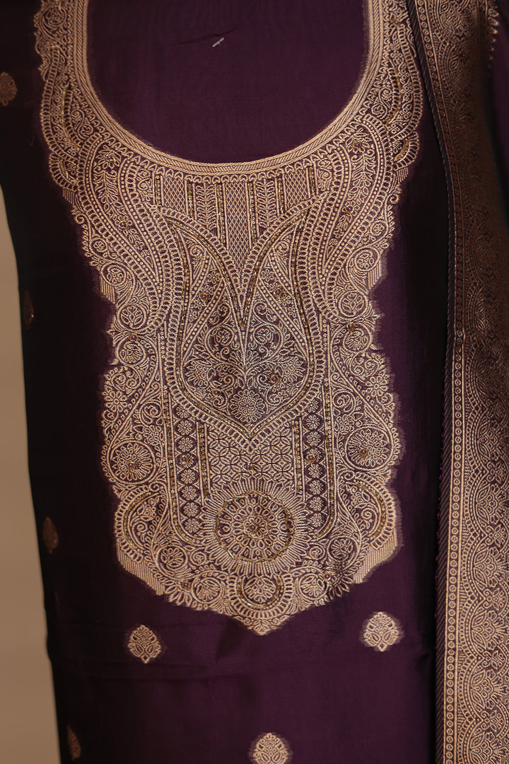 Banarasi silk Unstitched Suit with Cutdana work.
