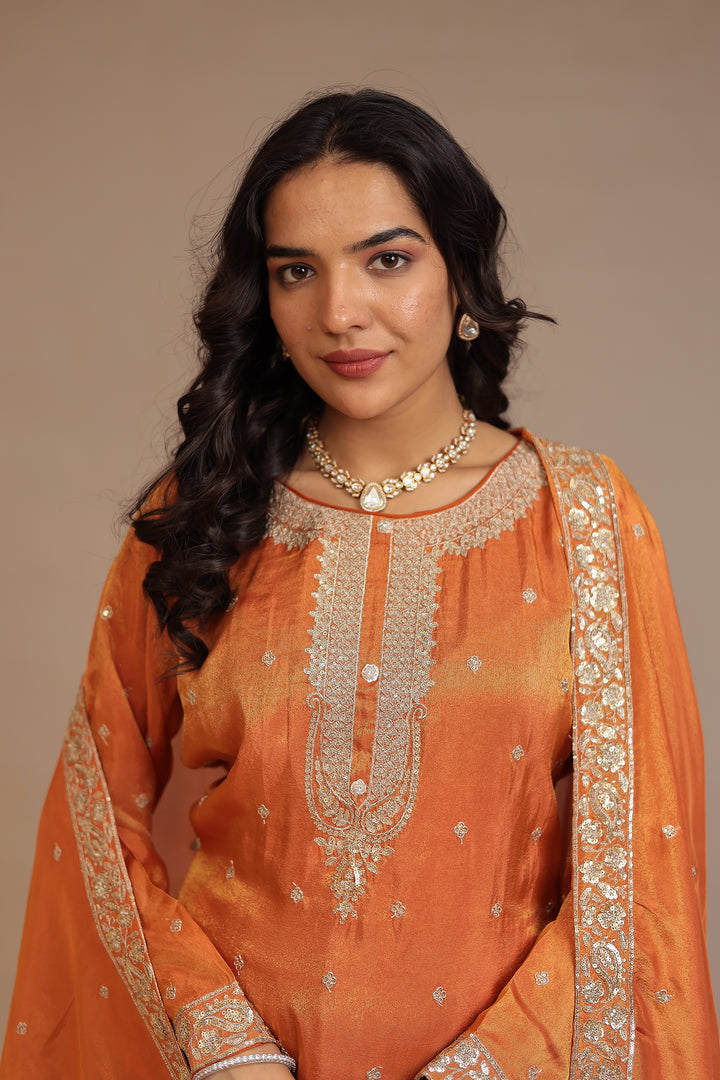 Tissue shimmer silk Suit  with Aari, Sequins, Zardozi work