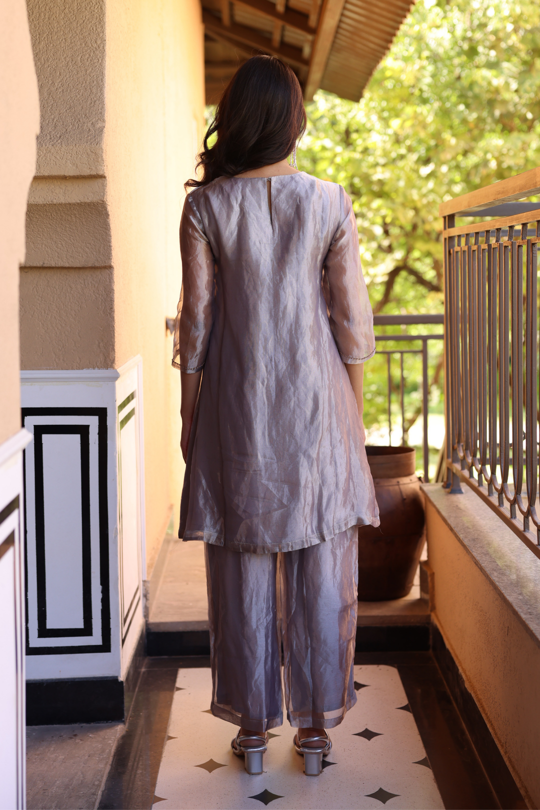 Tissue Kurta  with Thread work.