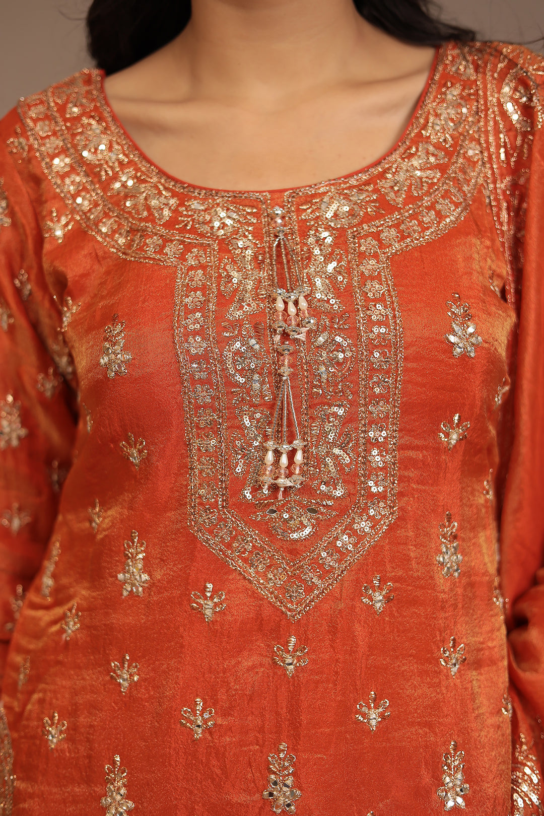 Tissue shimmer silk Suit with Aari, Cutdana, Sequins, Thread work.