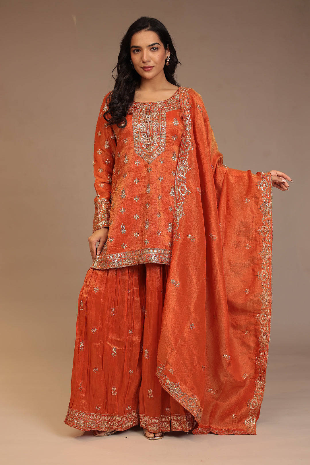 Tissue shimmer silk Suit with Aari, Cutdana, Sequins, Thread work.
