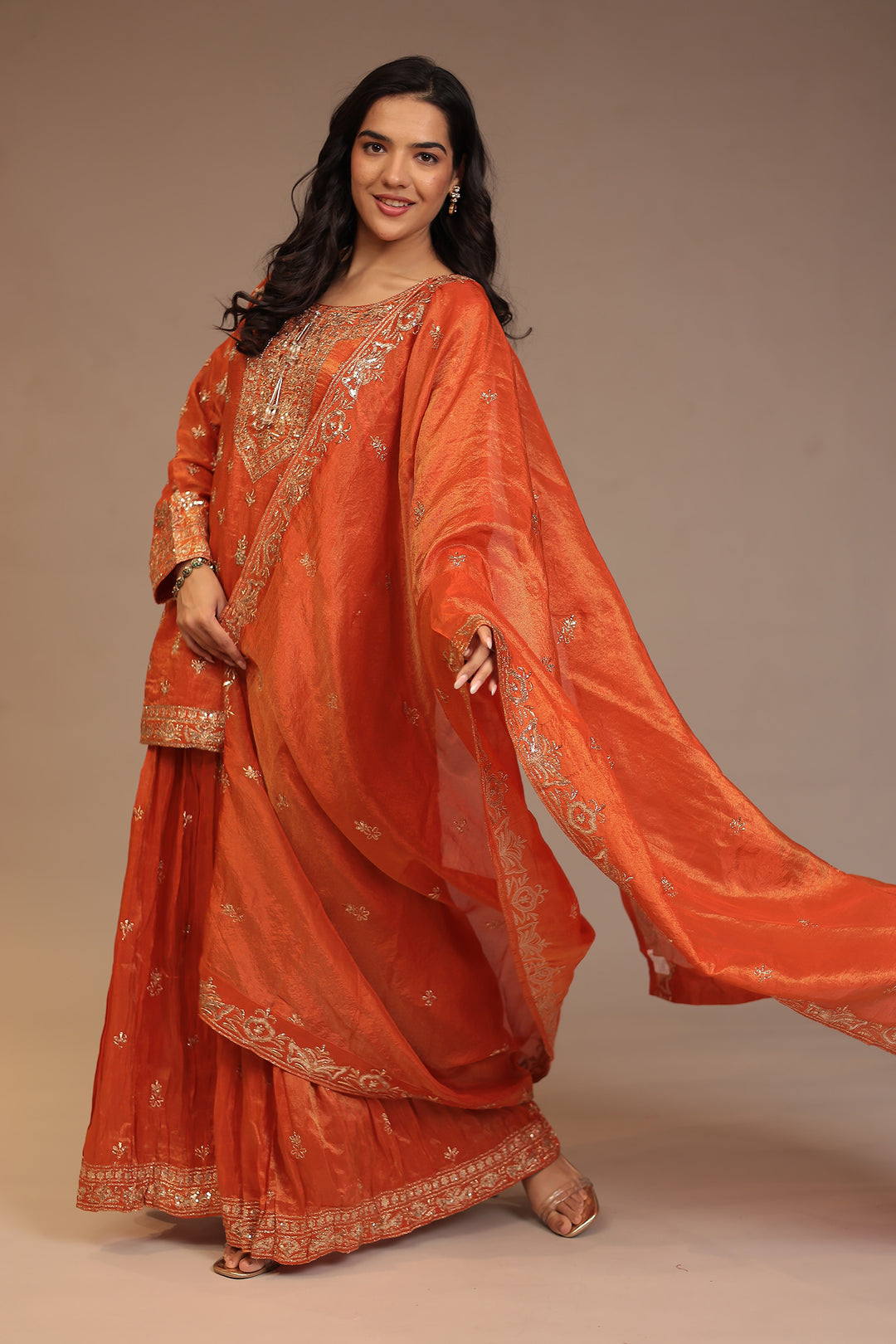 Tissue shimmer silk Suit with Aari, Cutdana, Sequins, Thread work.