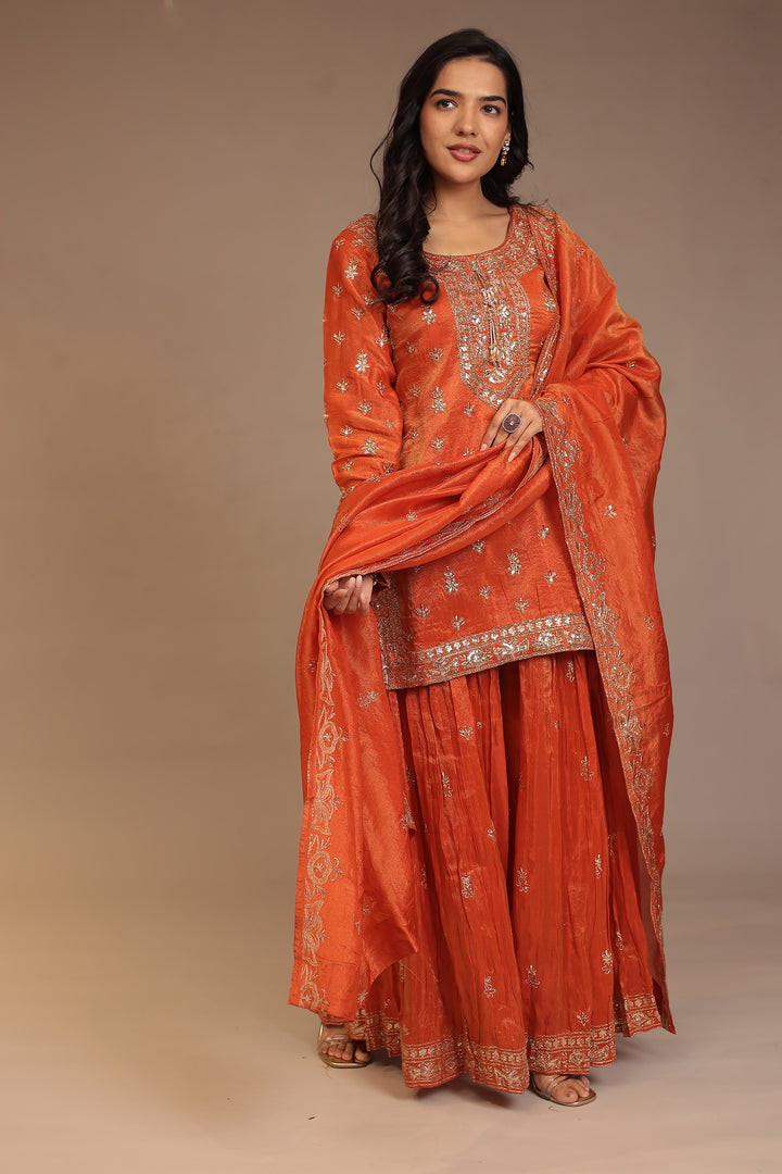Tissue shimmer silk Suit with Aari, Cutdana, Sequins, Thread work.