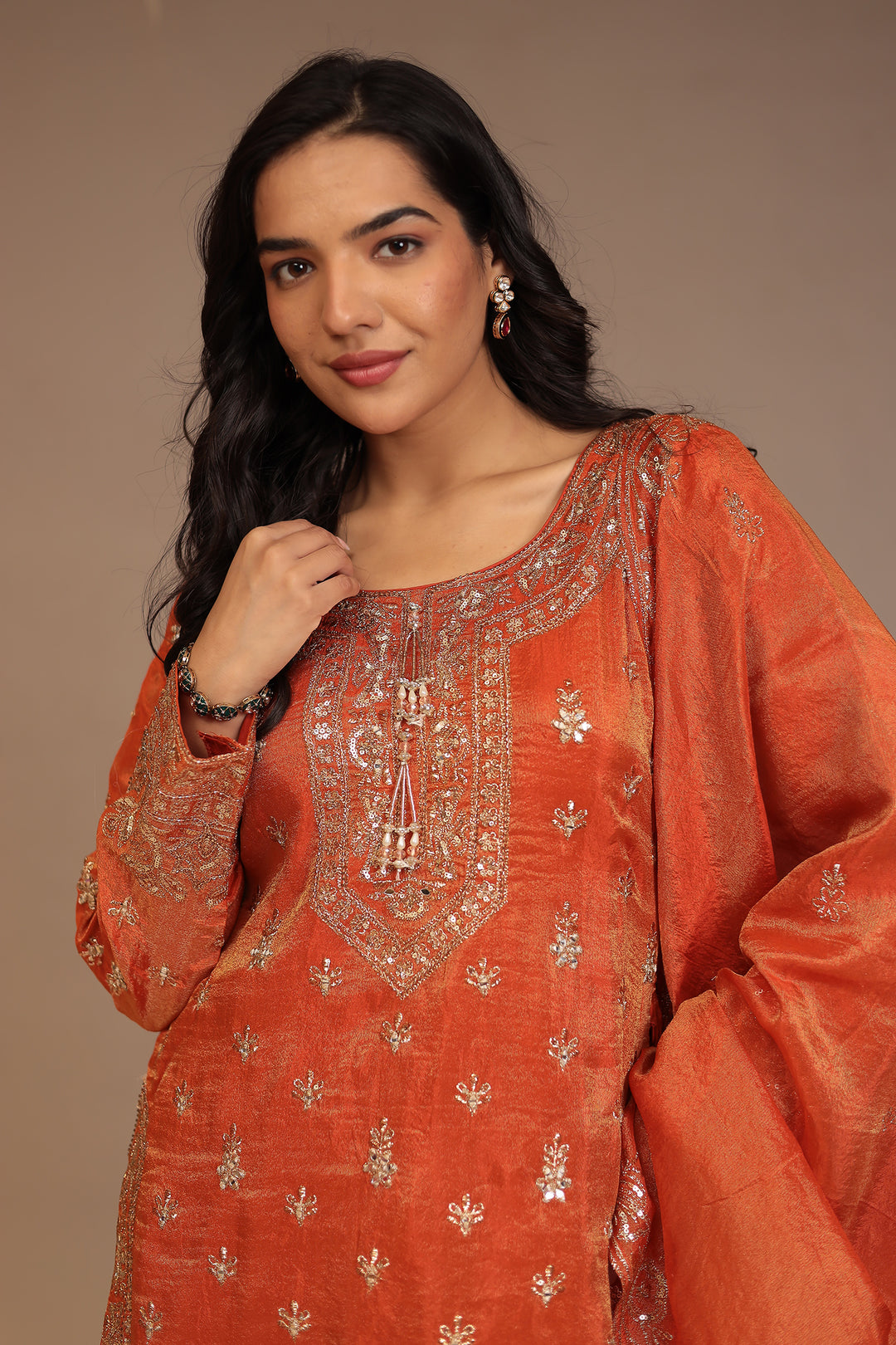 Tissue shimmer silk Suit with Aari, Cutdana, Sequins, Thread work.