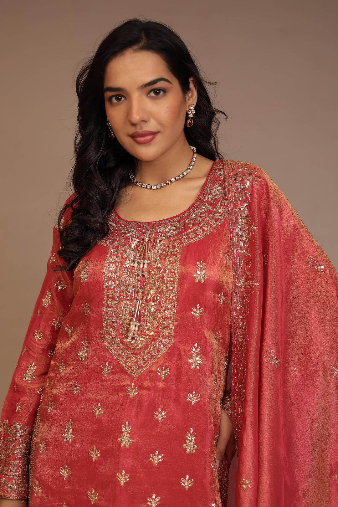 Tissue shimmer silk Suit with Aari, Cutdana, Sequins, Thread work.