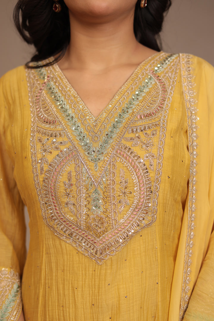 Silk blend Suit with Aari, Sequins, Stone work.