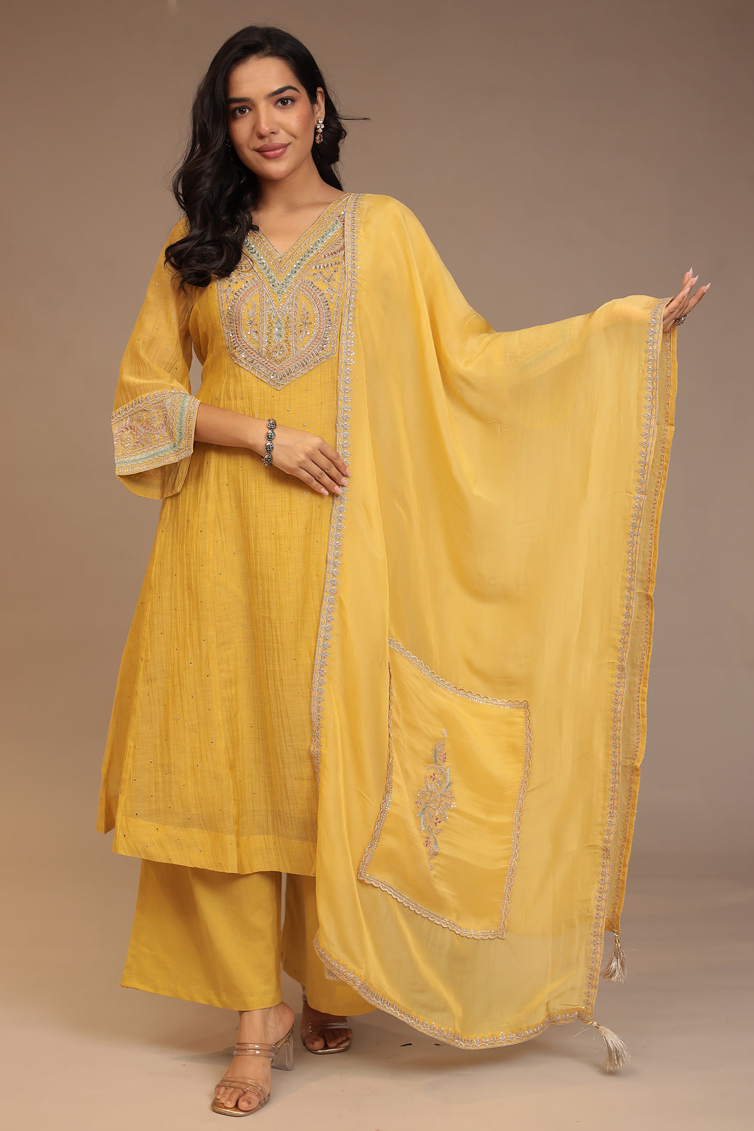 Silk blend Suit with Aari, Sequins, Stone work.