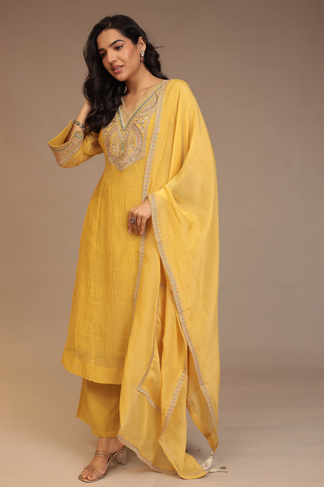 Silk blend Suit with Aari, Sequins, Stone work.