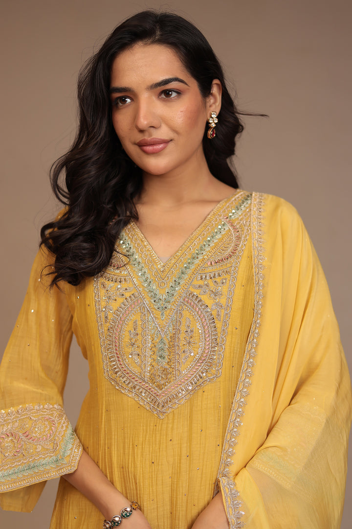 Silk blend Suit with Aari, Sequins, Stone work.