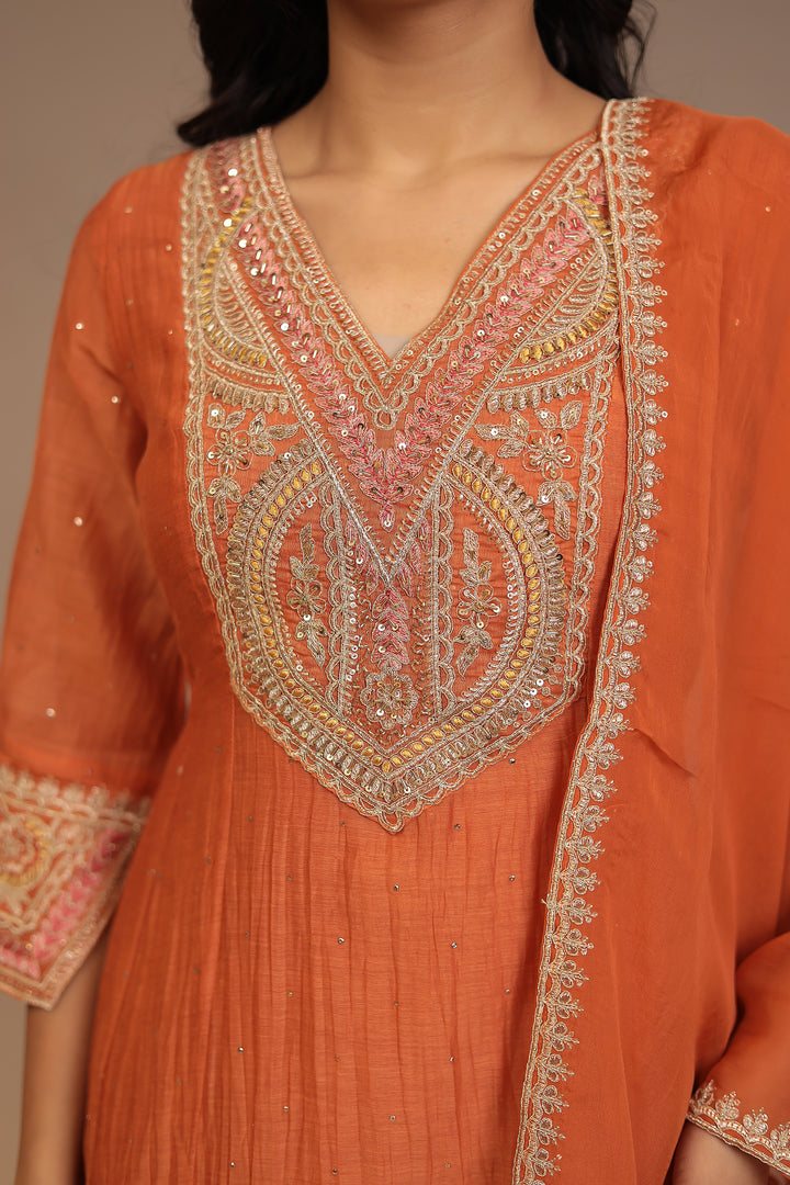 Silk blend Suit with Aari, Pearl, Sequins, Thread work.