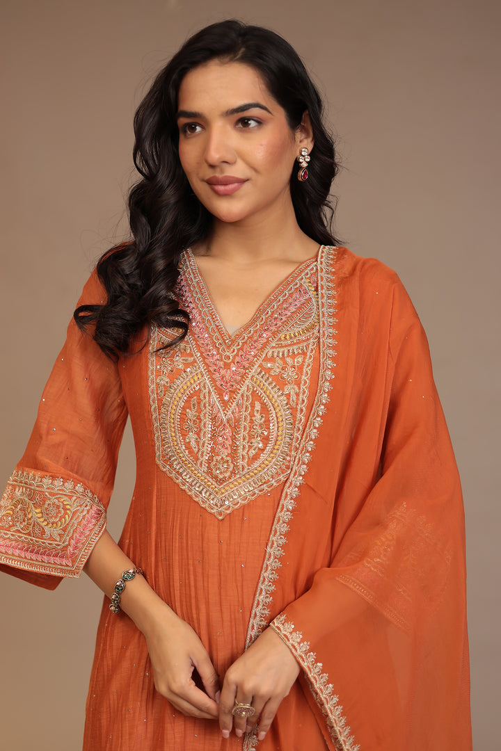 Silk blend Suit with Aari, Pearl, Sequins, Thread work.