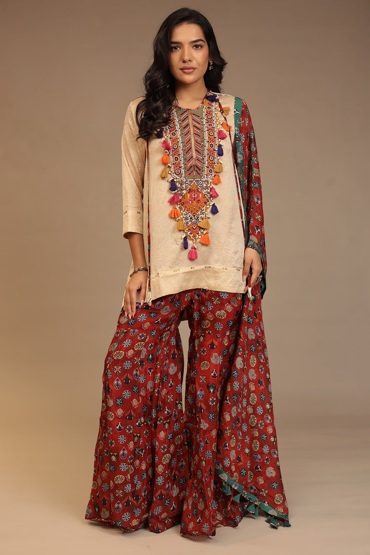 Crepe silk Suit with Pearl, Sequins, Thread work.