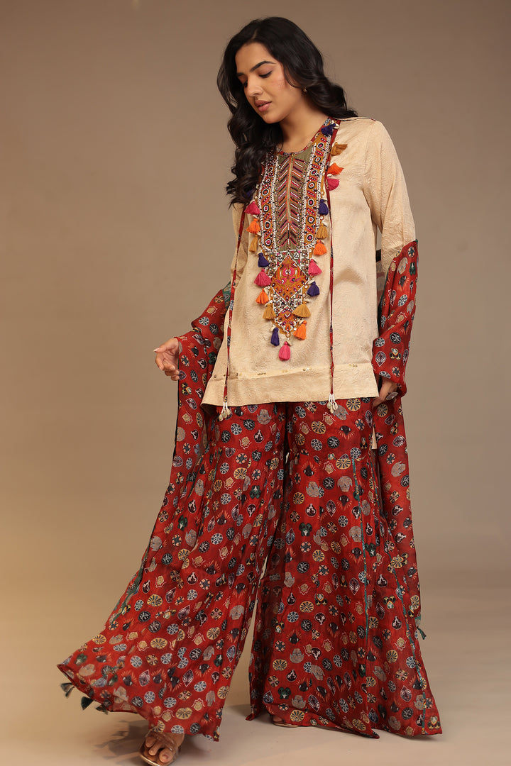 Crepe silk Suit with Pearl, Sequins, Thread work.