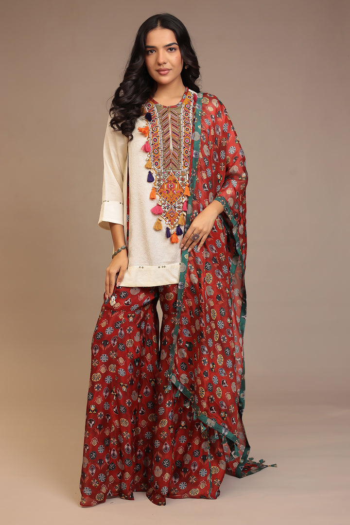 Crepe silk Suit with Pearl, Sequins, Thread work.