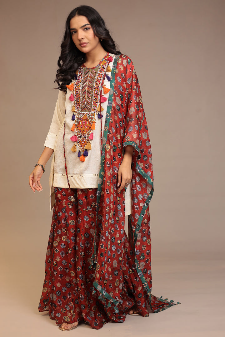 Crepe silk Suit with Pearl, Sequins, Thread work.