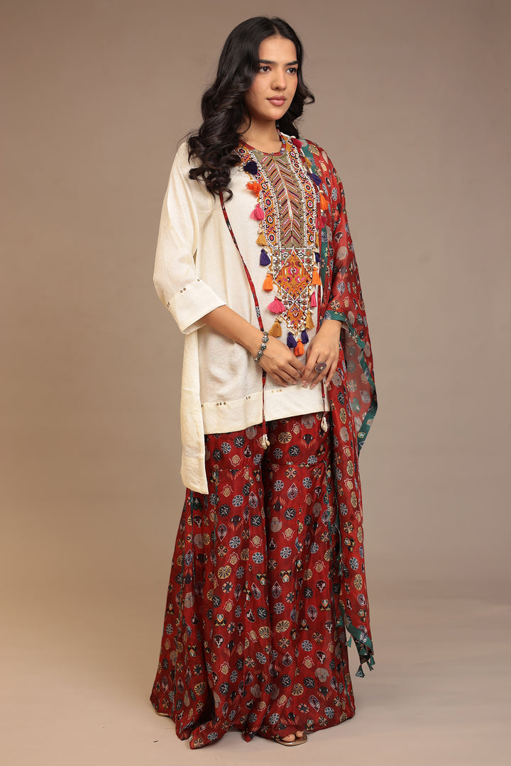 Crepe silk Suit with Pearl, Sequins, Thread work.