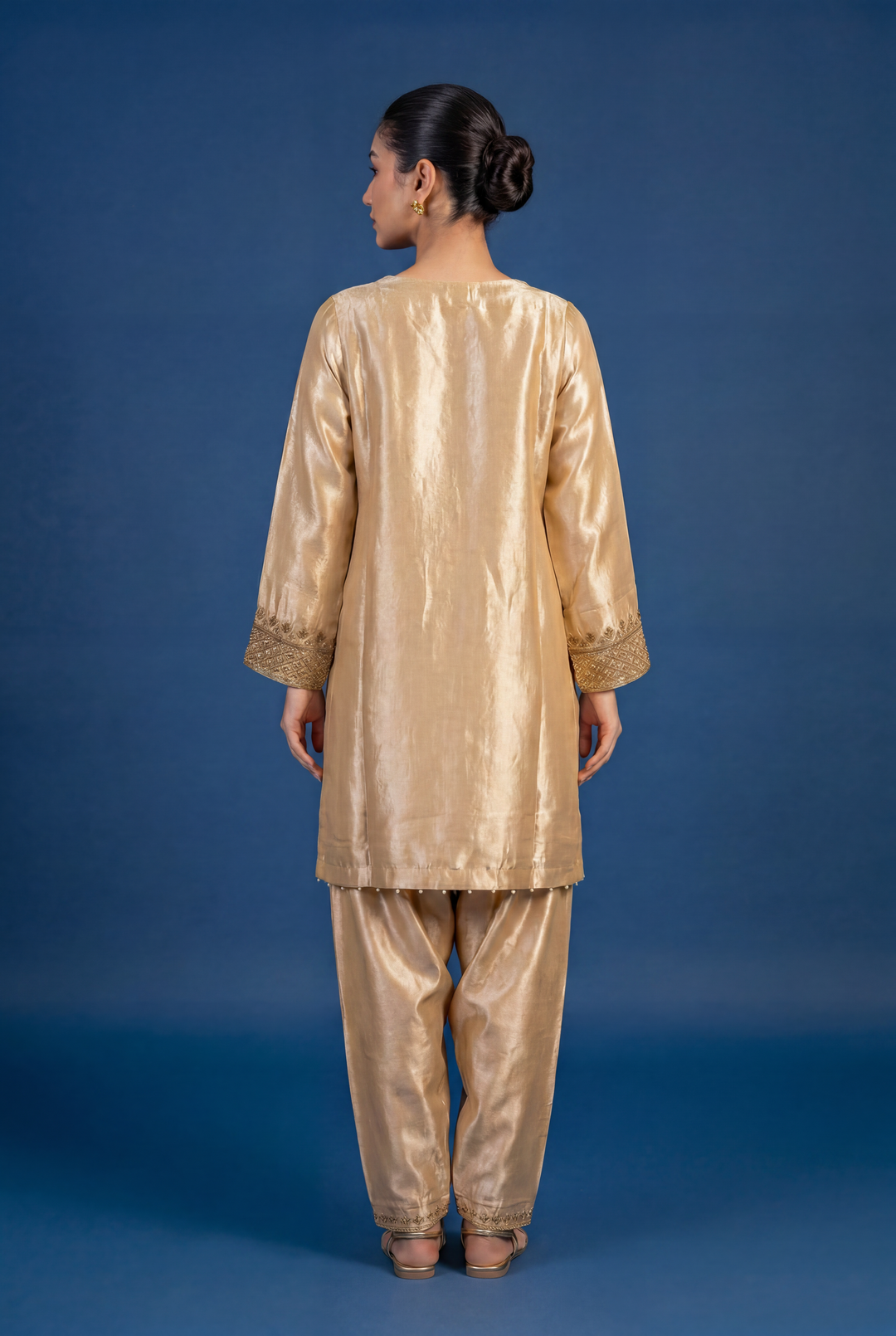 Tissue Silk Suit with Cutdana, Sequins, Zardozi work.