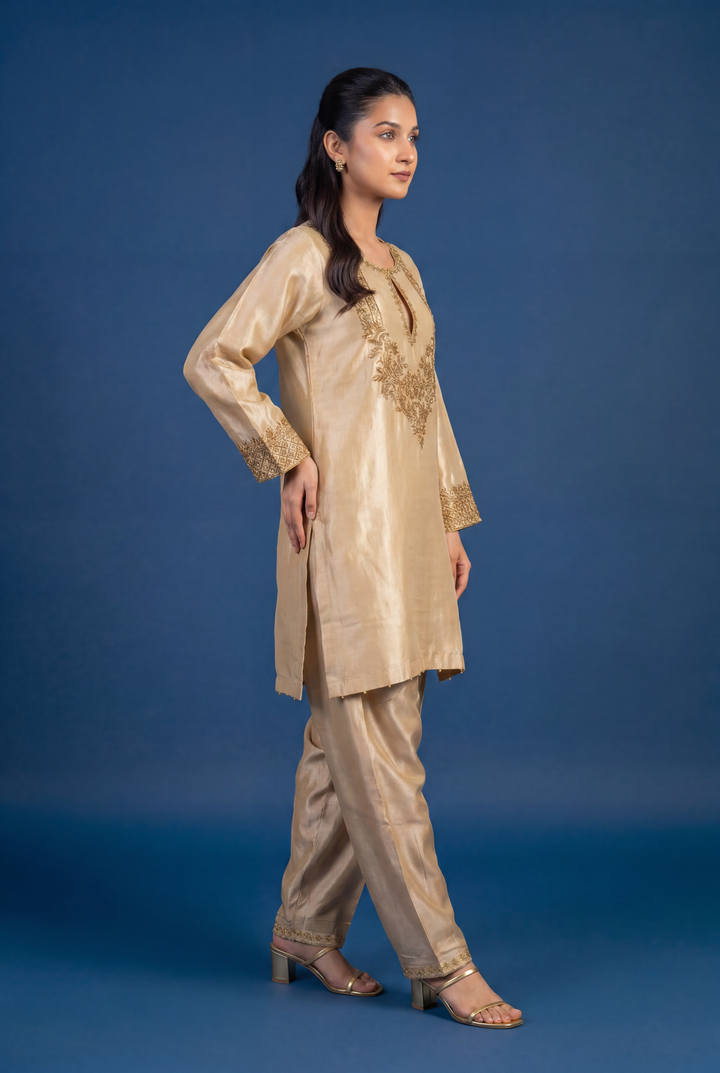 Tissue Silk Suit with Cutdana, Sequins, Zardozi work.