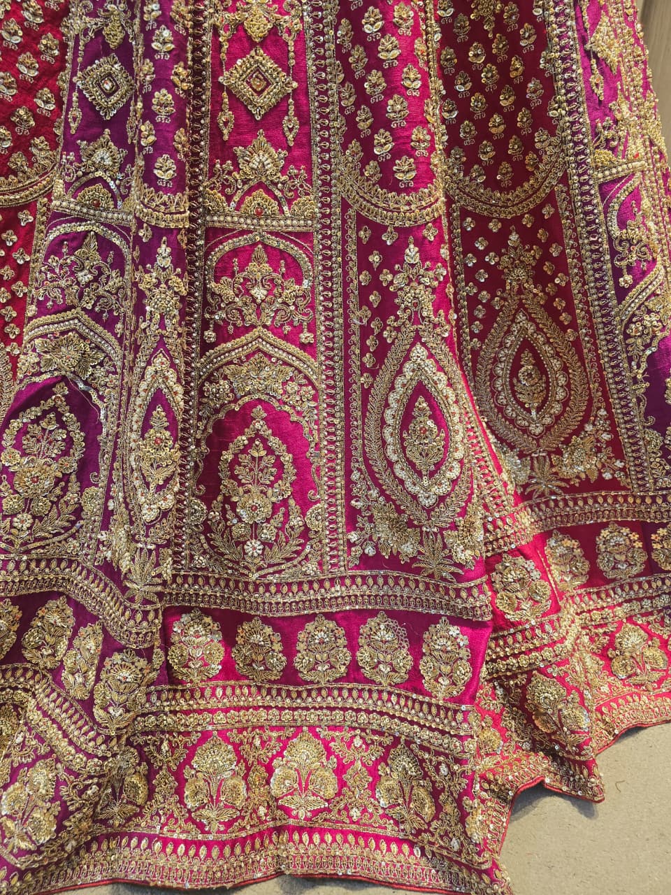 Silk Lehenga with Aari, Cutdana, Dori, Sequins, Stone, Thread, Zardozi, Zari work.