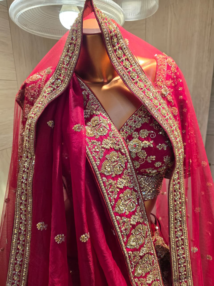 Silk Lehenga with Aari, Cutdana, Dori, Sequins, Stone, Thread, Zardozi, Zari work.