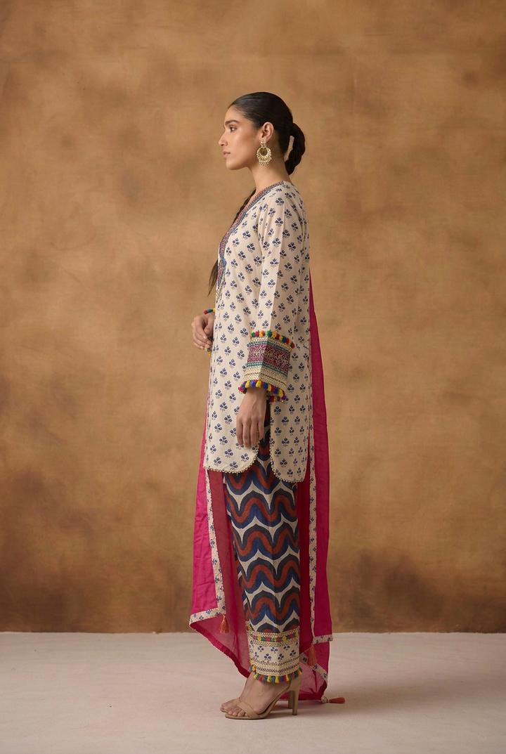 Crepe silk Suit with Mirror, Pearl, Thread work.