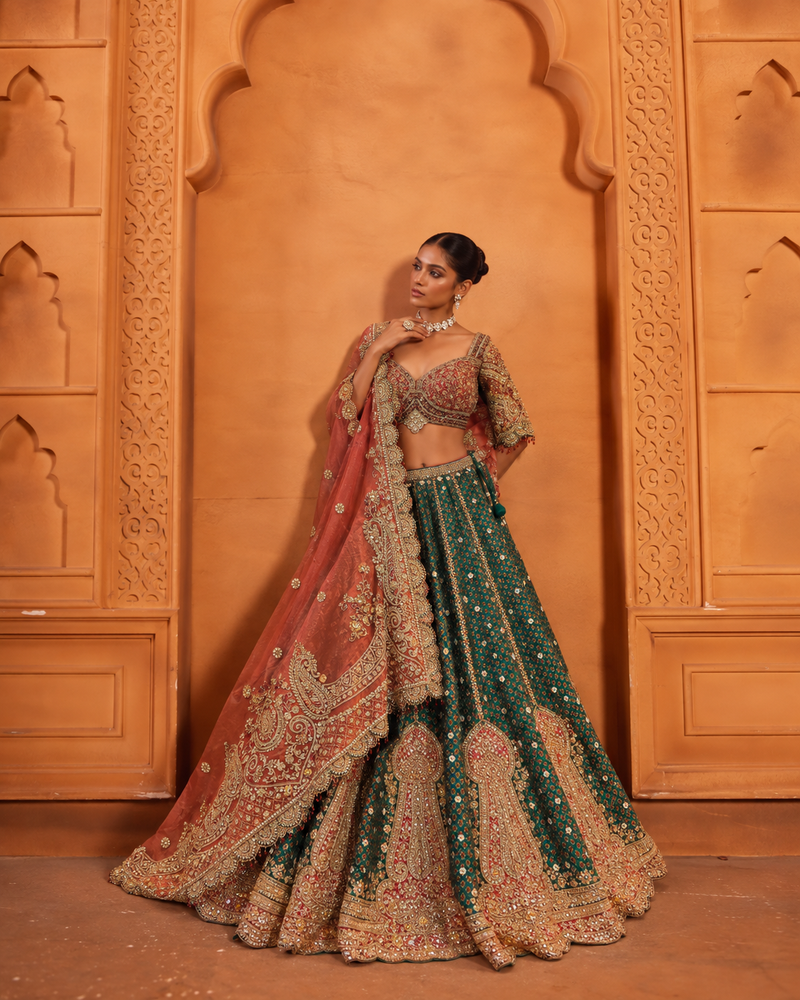 Silk Lehenga with Aari, Cutdana, Dori, Gota Patti, Sequins, Stone, Thread, Zardozi, Zari work.