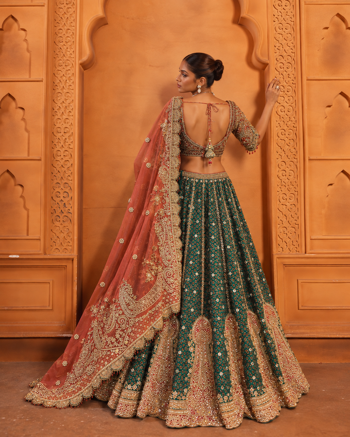 Silk Lehenga with Aari, Cutdana, Dori, Gota Patti, Sequins, Stone, Thread, Zardozi, Zari work.
