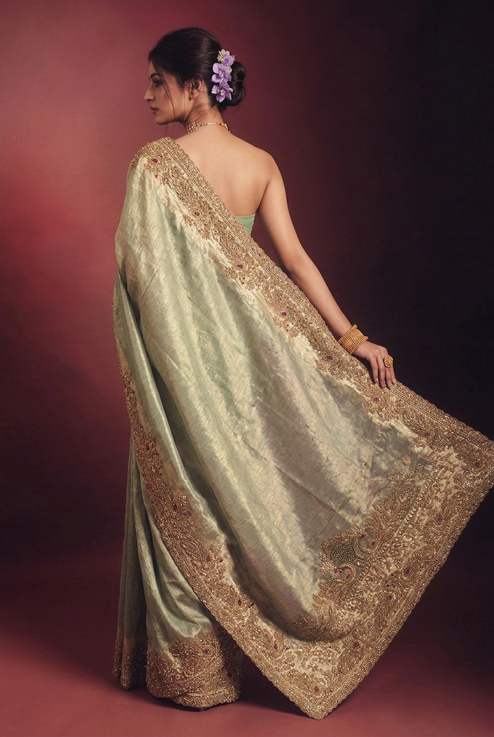 Tissue organza Saree with Aari, Sequins, Stone work.