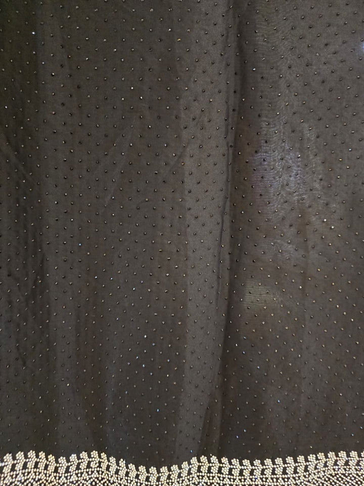 Georgette Saree with Swarovski work.