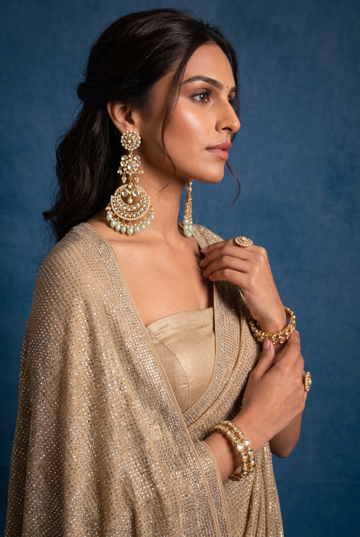 Georgette Saree with Stone work.